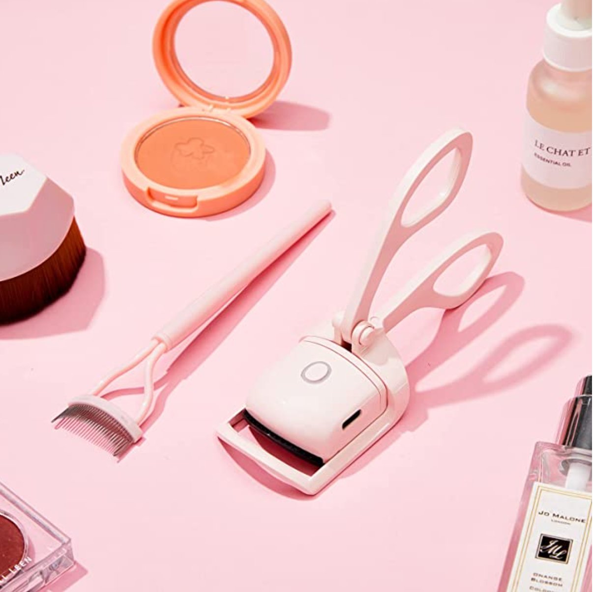 The AuraCurl Heated Lash Curler - A 24-Hour Lift, No Crimping + 50% OFF
