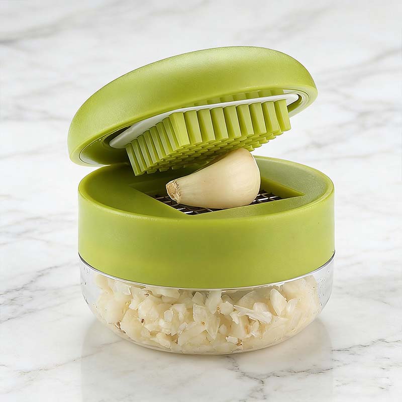 Mincely™ – One-Press Stainless Steel Garlic Chopper with Catch Container + 50% OFF