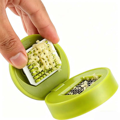Mincely™ – One-Press Stainless Steel Garlic Chopper with Catch Container + 50% OFF